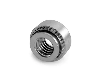 A self-clinching-nut on a white background.