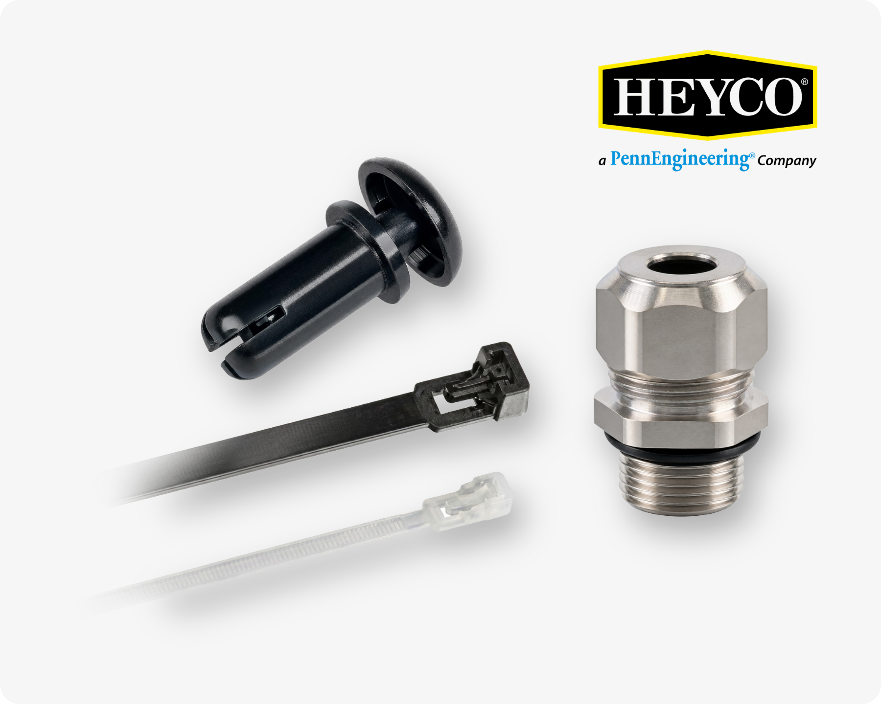 Different Heyco fastening solutions, including cable ties, a cable gland and a HeyClip push-in fastener on light grey background with the Heyco logo in the top right corner.