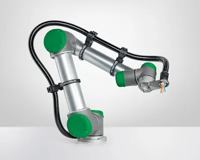 Silver and green collaborative robotic arm with black cable conduit and orange-blue wires at end effector on white surface.