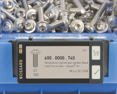 Blue plastic container containing screws, with a SmartLabel Cloud affixed to the bin.