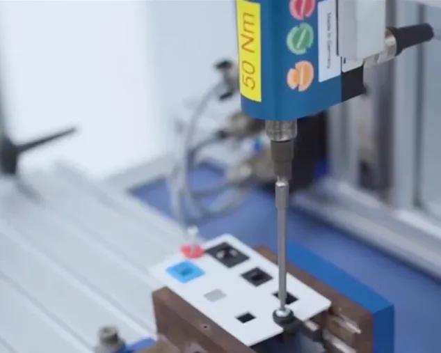 Closeup of MM-Welding ultrasonic welding equipment operating