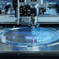 Silicon dies are being extracted by semiconductor wafer machine