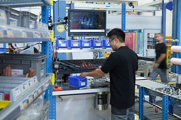 A detailed view of the work cell equipped with SmartBins.