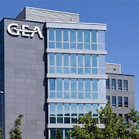 A Gea company office building with blue sky in the background