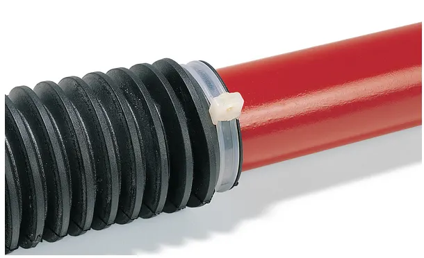 Close-up of a HellermannTyton KR cable tie, locked by a special glass fiber pin