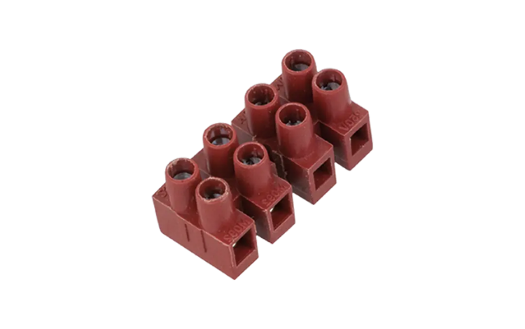 A red BM Group terminal block on white background
