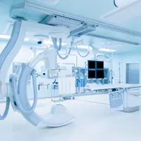 Complicated medical devices in a room.
