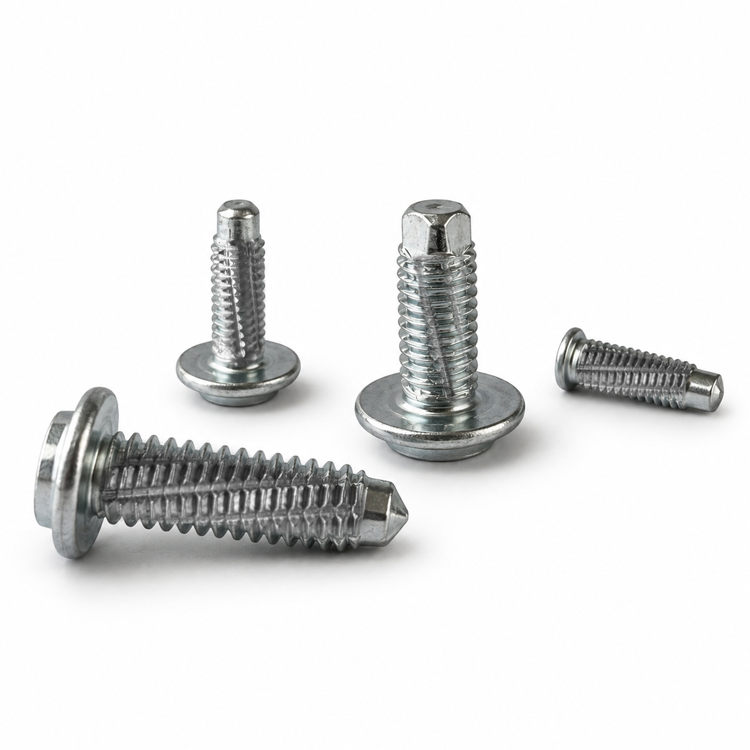 Four Tucker paint-clear studs for drawn-arc stud welding on white background