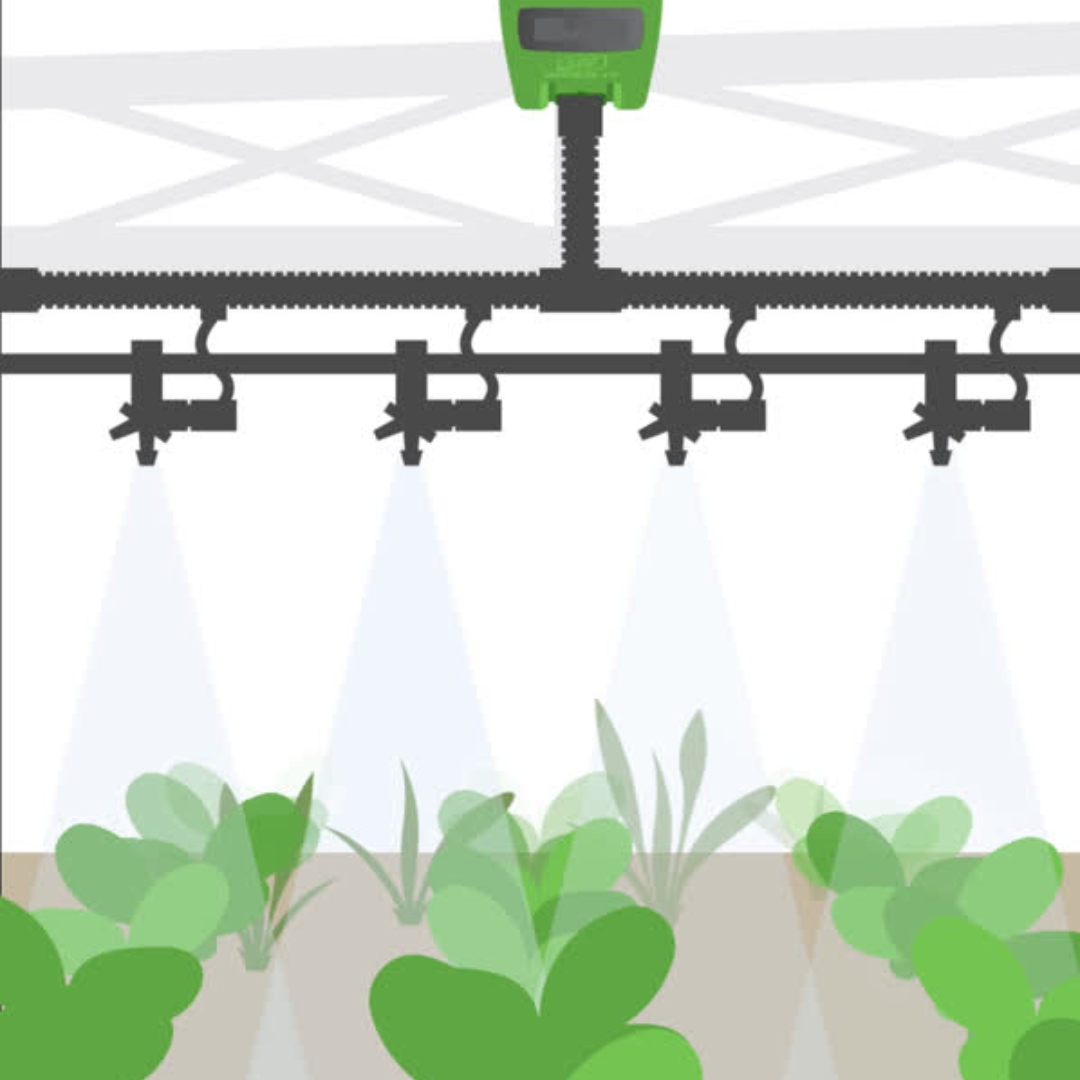 Cartoon-style weed-it system with black rail-mounted sprinklers spraying onto green plants.