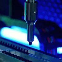 High-tech ultrasonic welding process machine for electric vehicle components.