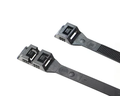 Two black Elematic Easy Belturing cable ties on white background