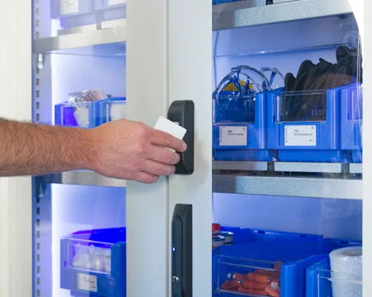 Person gains access to MRO material locked in a SmartLocker via RFID card
