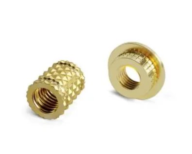 Lightweight threaded inserts and thermoplastic housing on white background
