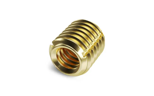 A brass Tappex Trisert threaded insert on white background