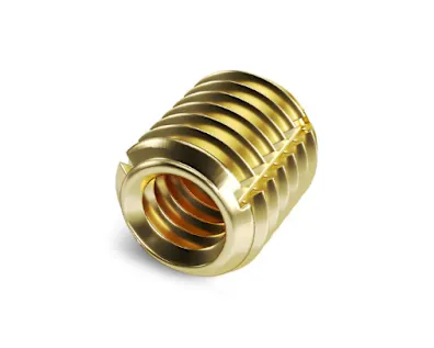 A brass Tappex Trisert threaded insert on white background