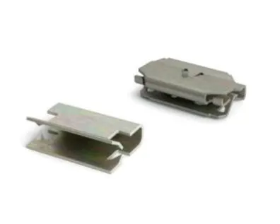 A set of metal trim clips on white background