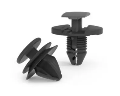 A set of plastic trim clips and push fasteners on white background
