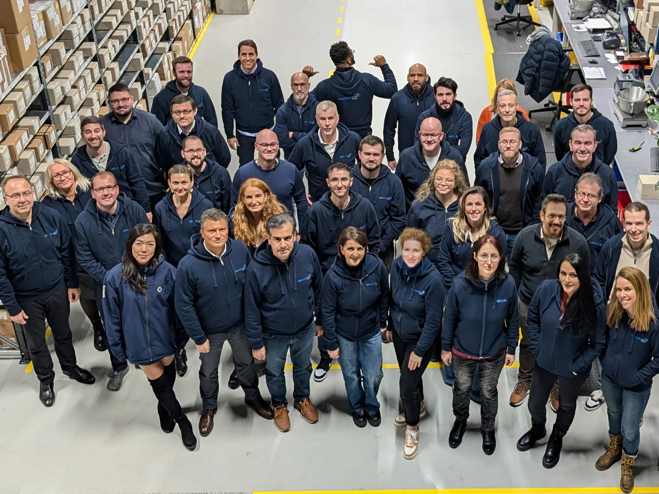 group picture of bossard aerospace employees
