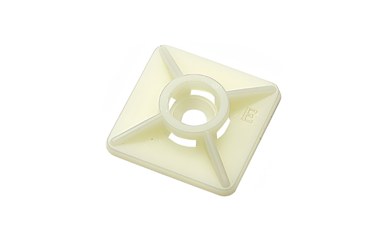 A white Elematic two-way cable mount for securing cables and wires onto any smooth surface  on white background.