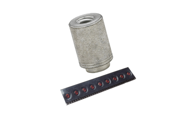A PEM spacer and a strip of taped PEM SMT Spacers, designed for PC board mounting, on white background