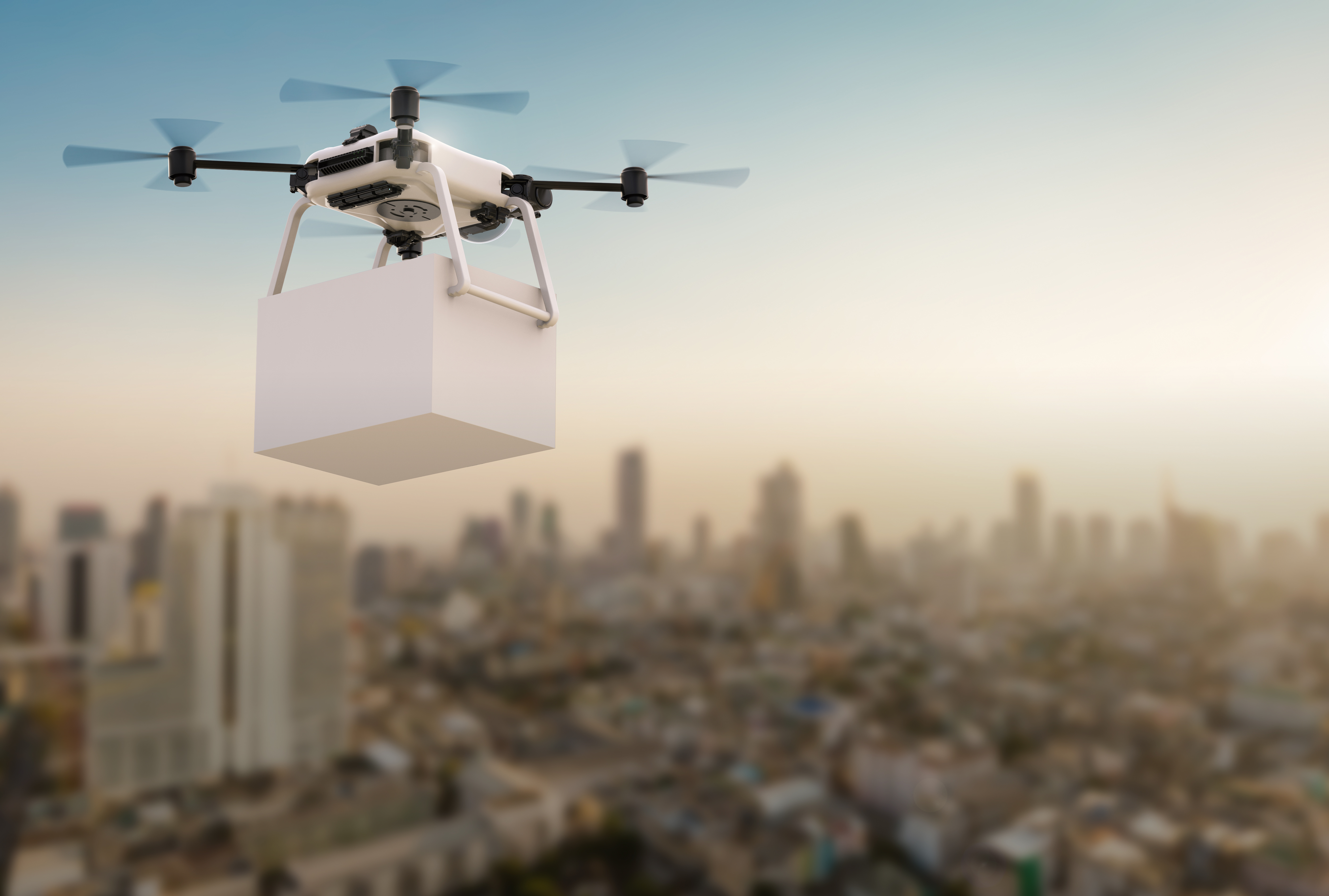 A futuristic drone soaring above a cityscape, symbolizing the advancement of drone delivery technology.