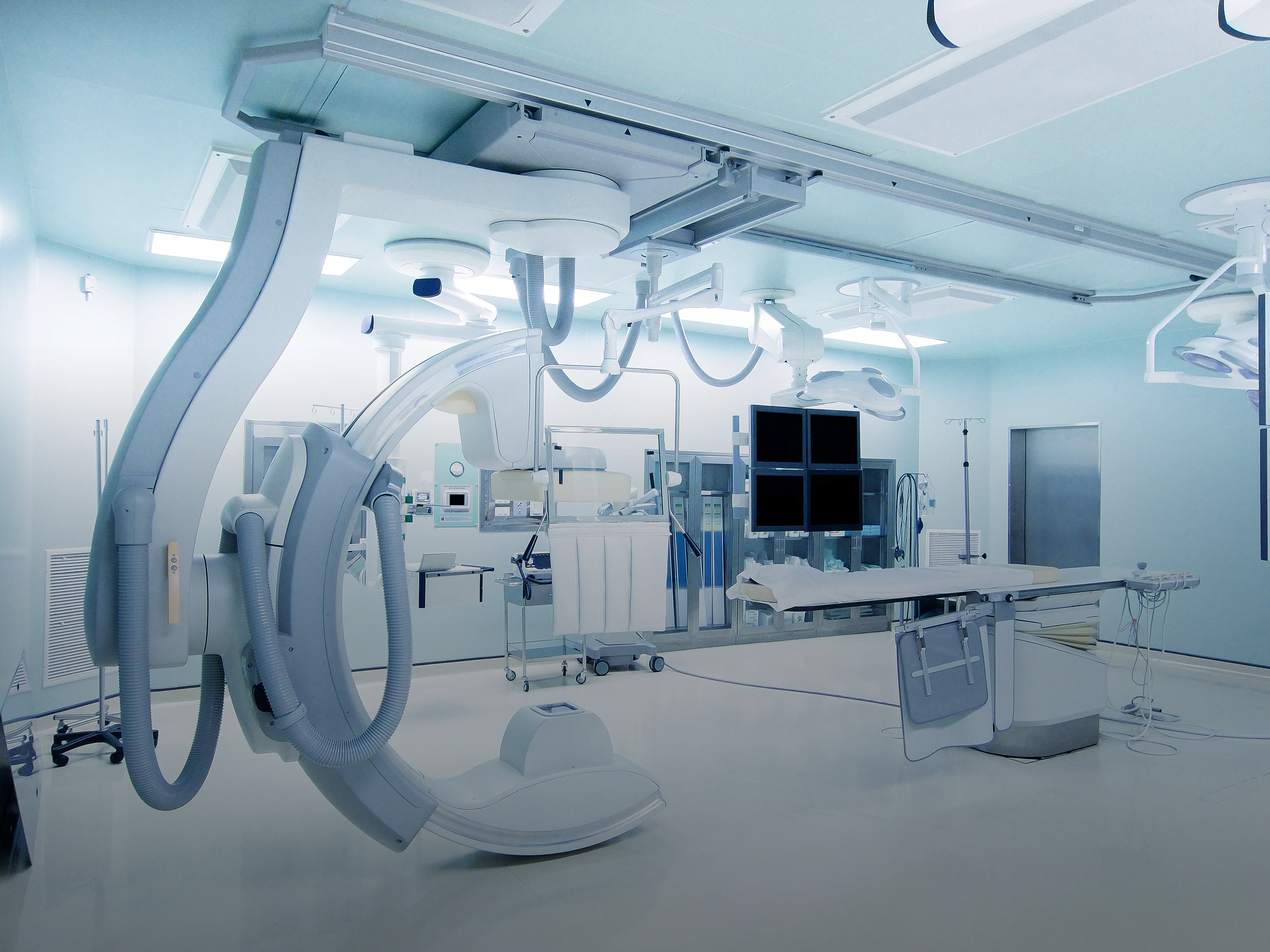 Complicated medical devices in a room.