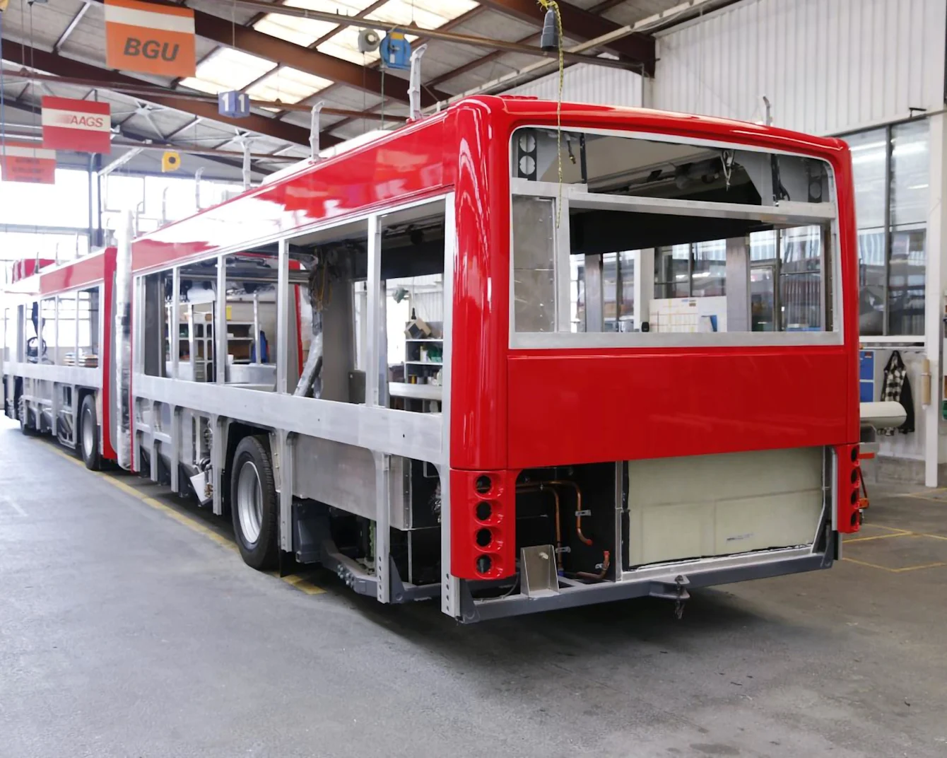 Red bus under construction