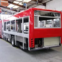 Red bus under construction