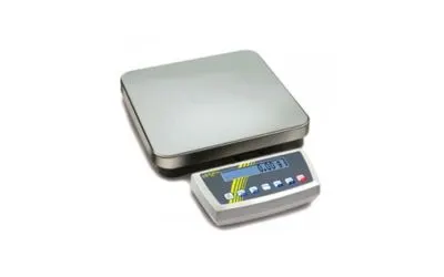 Digital scale with a stainless steel platform and a separate LCD display showing numbers, surrounded by control buttons.